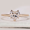 Heart diamond engagement ring in yellow gold.
