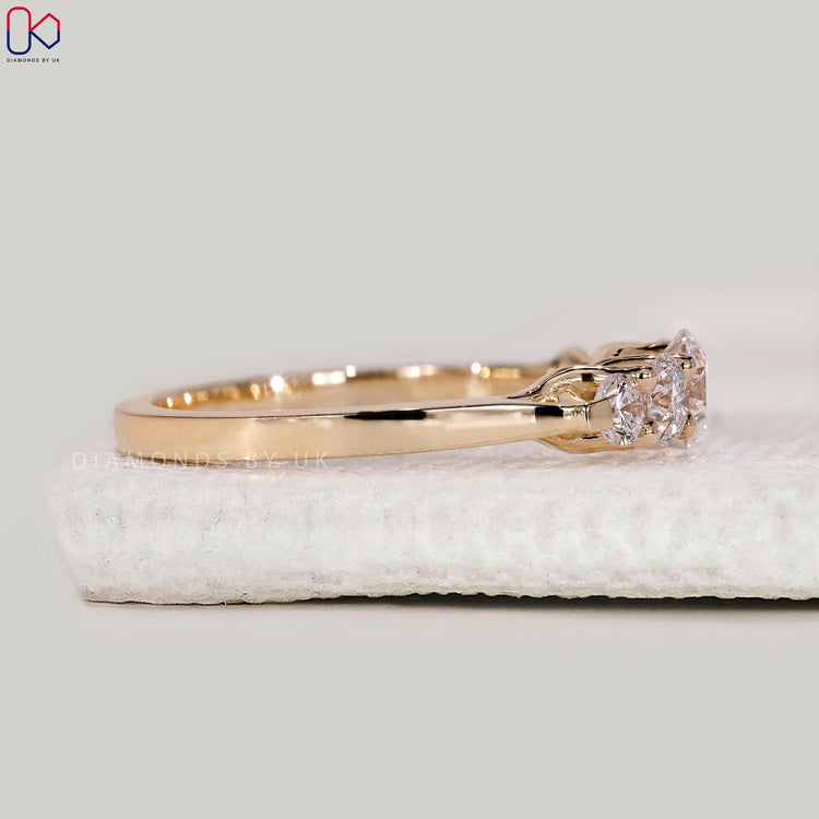 Buy wedding band in yellow gold.
