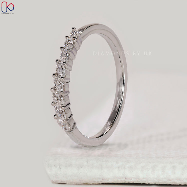 Custom diamond band with marquise stones.
