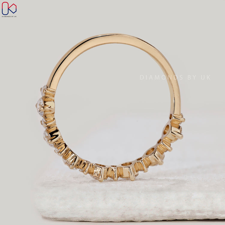 Handmade band with round diamonds.
