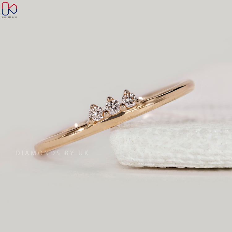 Buy wedding band with round diamonds.
