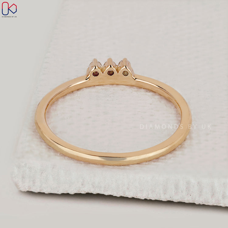 3 stone shared prong diamond band.
