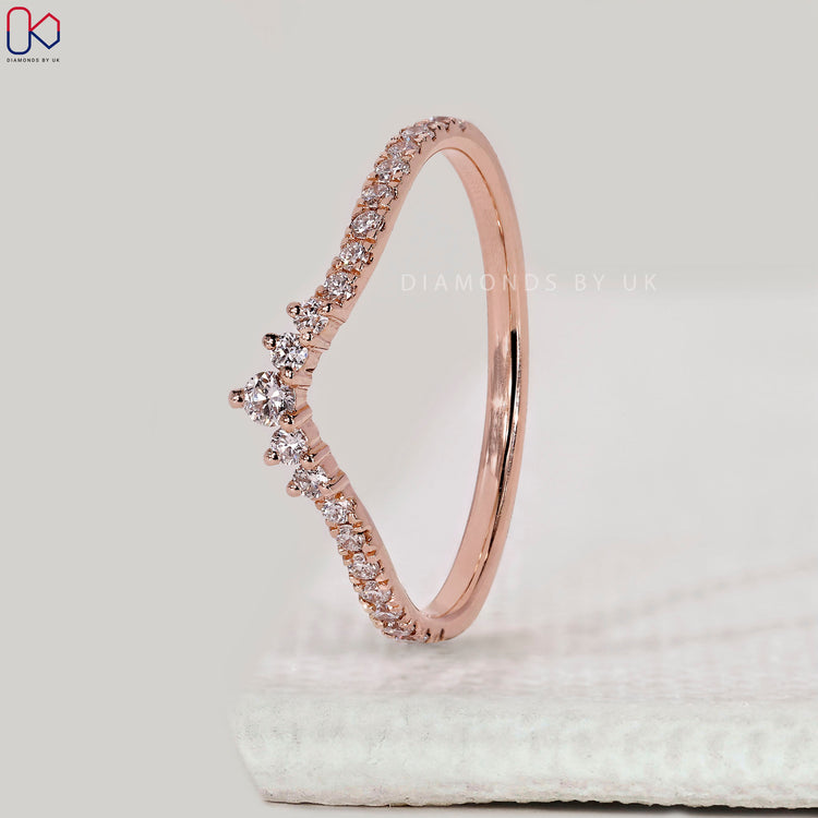 Half eternity wedding band with round diamonds.
