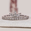 Marquise and round diamond band with tiara style design.
