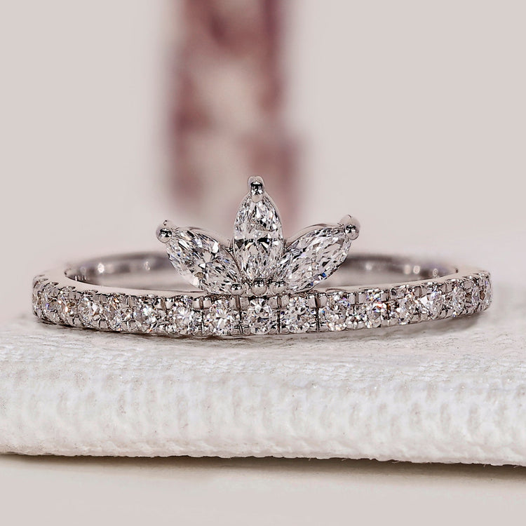 Marquise and round diamond band with tiara style design.
