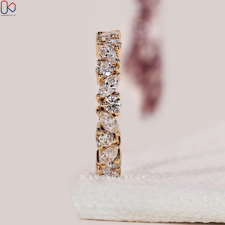 Round diamond wedding band made with lab grown stones and handmade precision.
