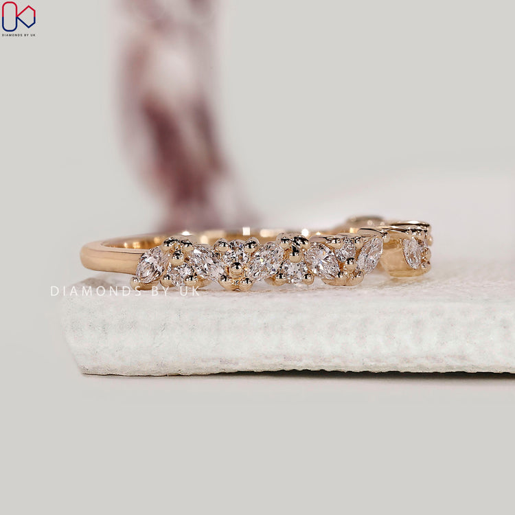 Round diamond wedding band designed with a cuff-style open gap for stacking ease.

