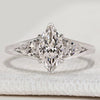 Marquise cut ring with pear side stone style.
