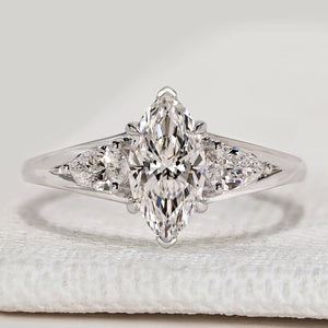 Marquise Cut Diamond Ring with Pear Side Stones