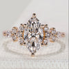 Marquise cut ring with round and pear side stones.

