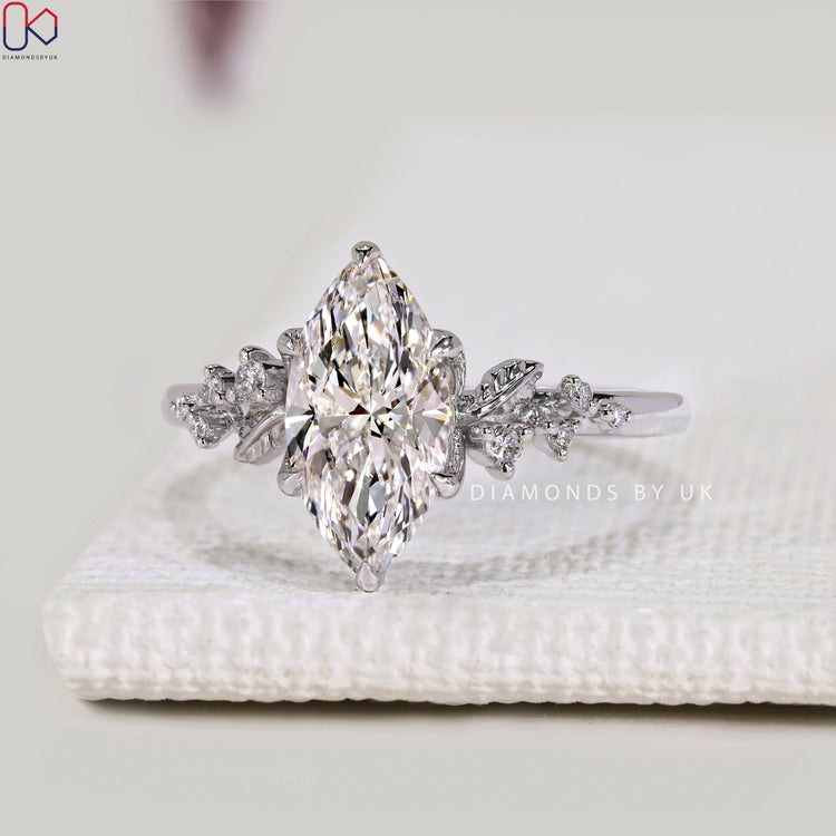 Lab grown marquise ring with six claw prong setting.
