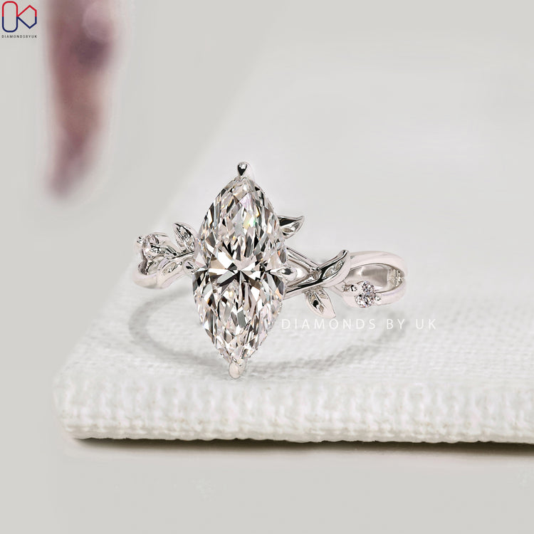 Seven stone marquise diamond ring with split shank.
