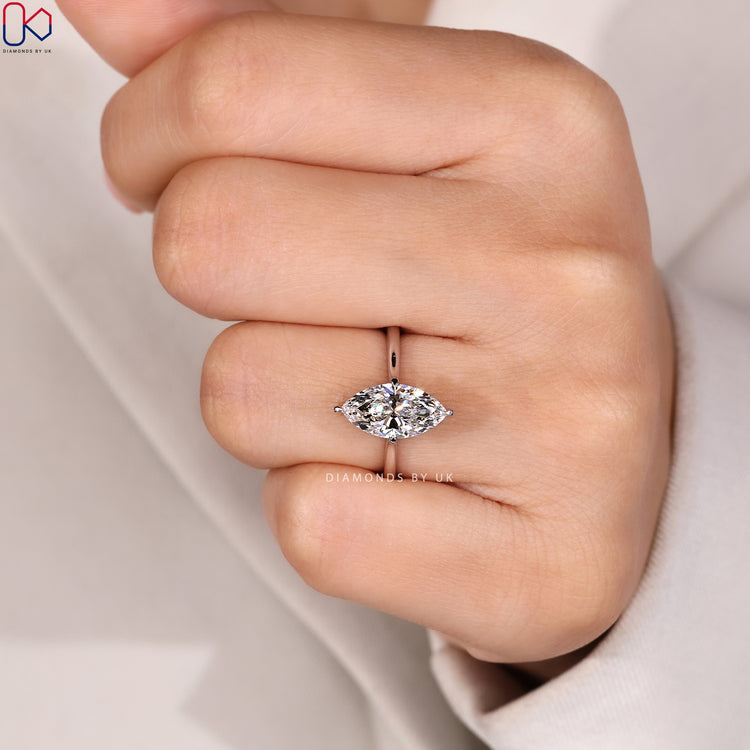Lab grown marquise ring with tapered shank.