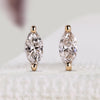 Marquise diamond earrings with stud and solitaire style.