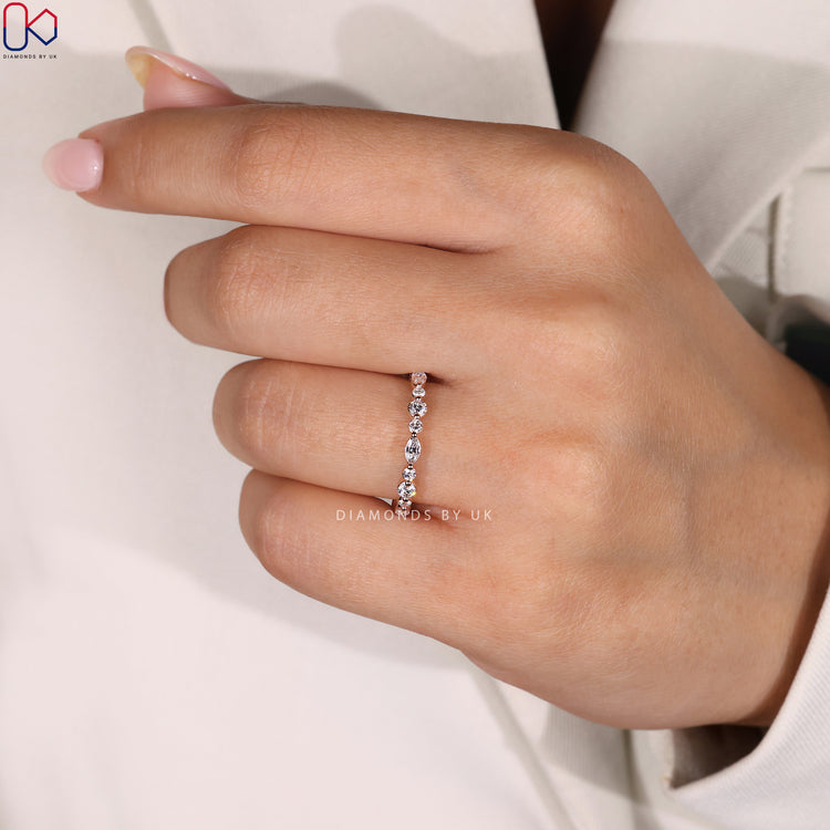 Shared prong wedding band with lab grown diamonds and IGI certificate.