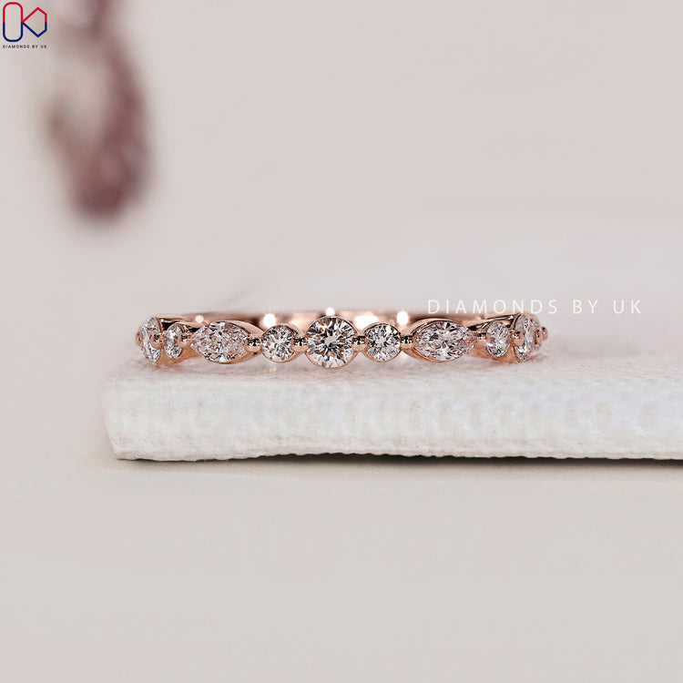 Diamondsbyuk wedding band with elegant half eternity diamond style.
