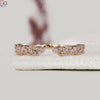 Open gap diamond wedding band featuring marquise and round lab grown diamonds.
