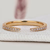 Open gap wedding band with round lab grown diamonds.