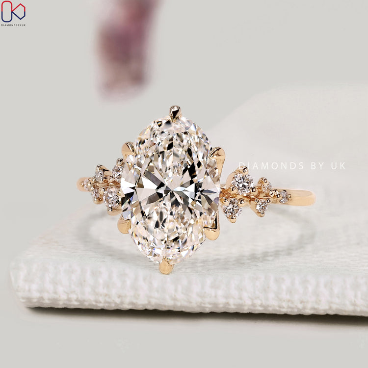 Vintage oval diamond ring with hidden round pink ruby.  
