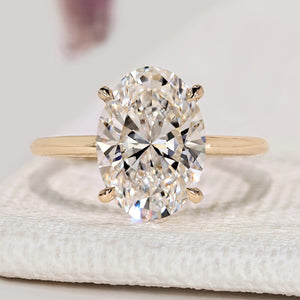 Oval Cut Diamond Engagement Ring with Hidden Halo Style
