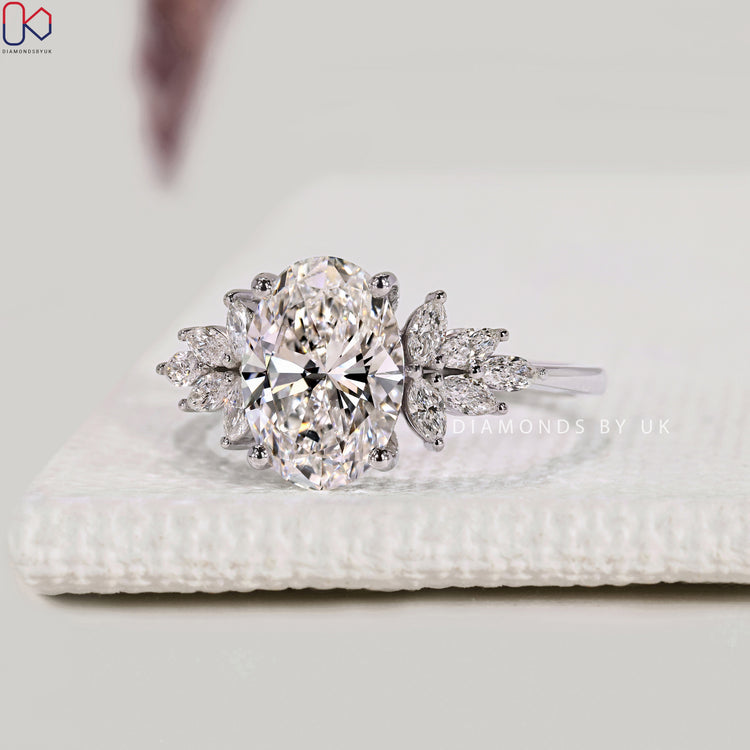 Lab grown oval diamond ring with basket setting.