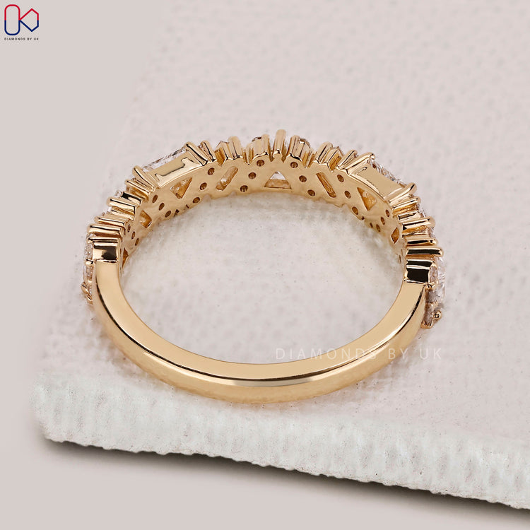 Handmade band with mixed diamond shapes.
