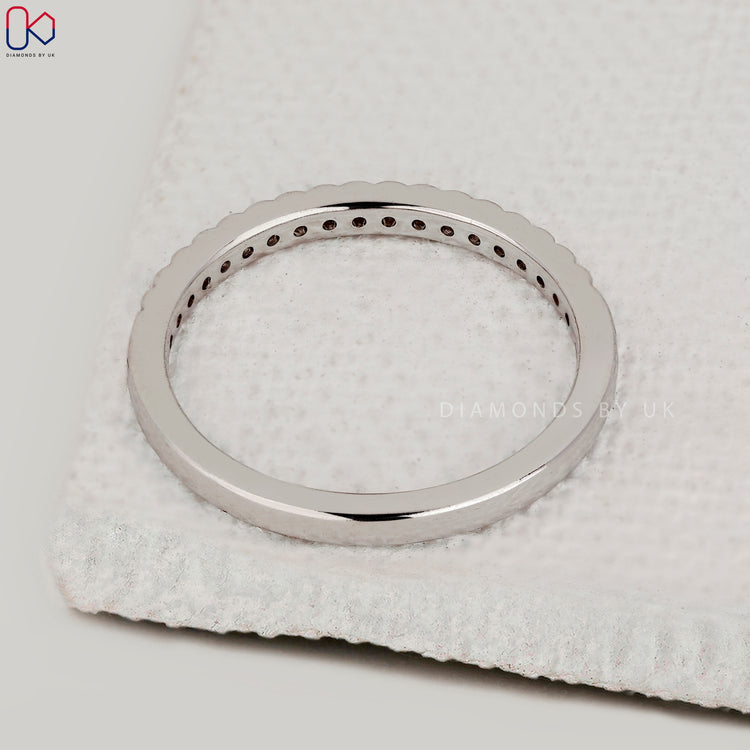 Handmade band with round diamonds.
