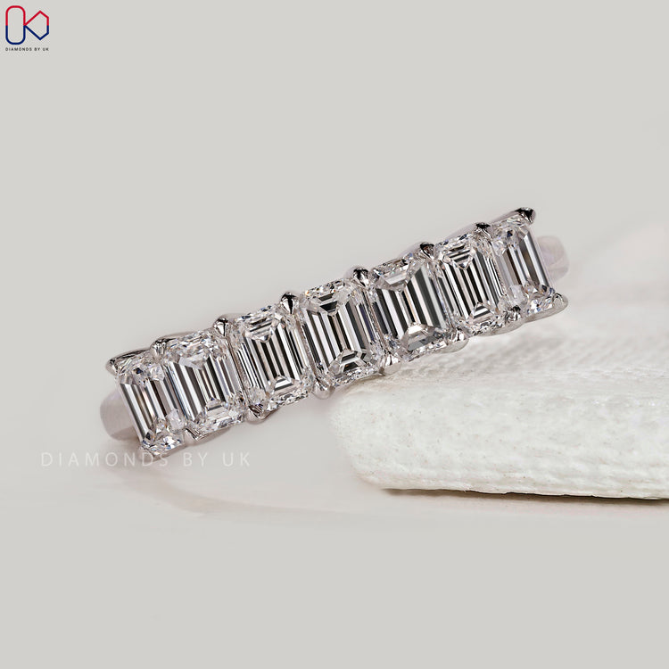 White gold wedding band with 7 stones.
