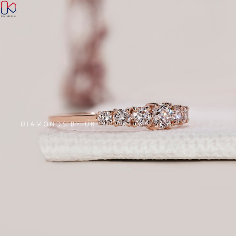 Buy diamond band with round cut lab grown stones.
