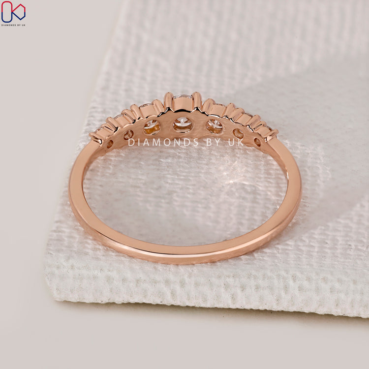 Custom wedding band with 7 round diamonds.
