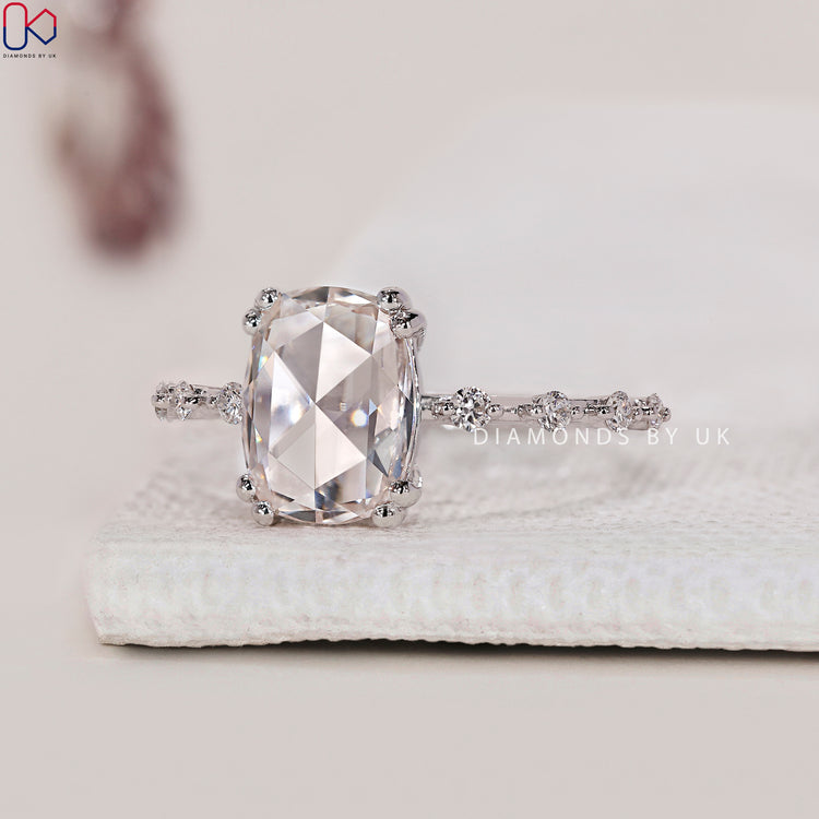Distance Pave Band Engagement Ring with Cushion Rose Cut Diamond, set in white gold with a double prong setting.
