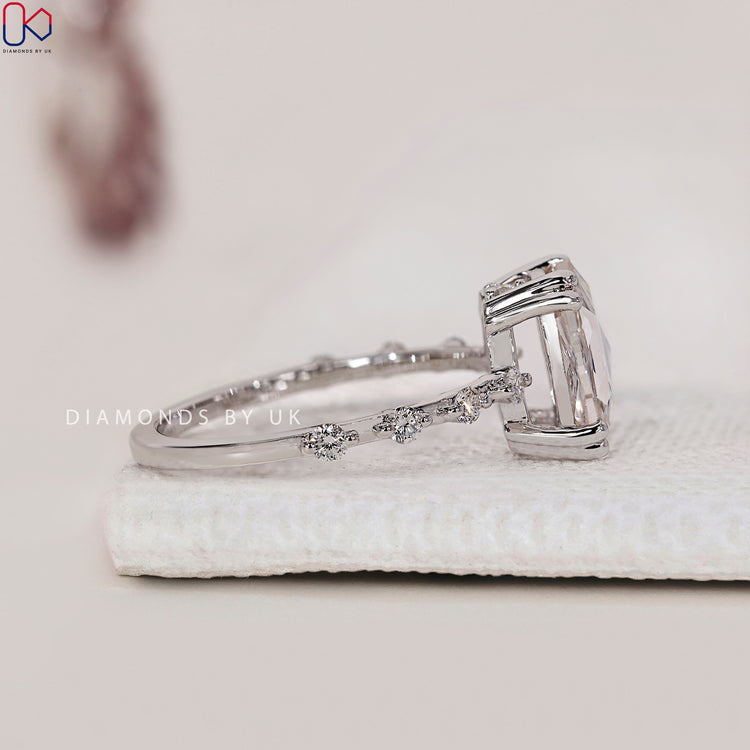 White Gold Ring with Cushion Cut Rose Diamond, prong setting, and round side diamonds for a brilliant look.
