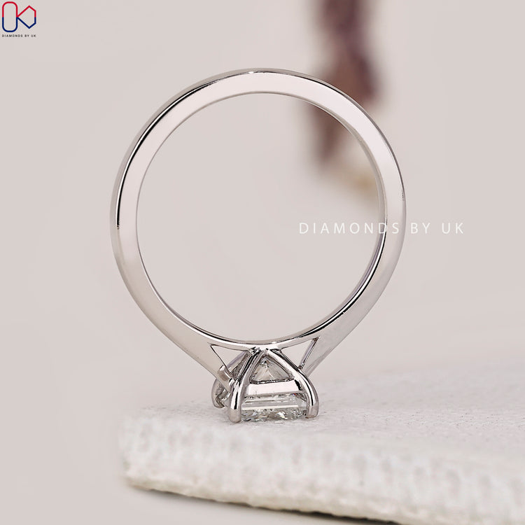 Diamondsbyuk ring and solitaire engagement ring.
