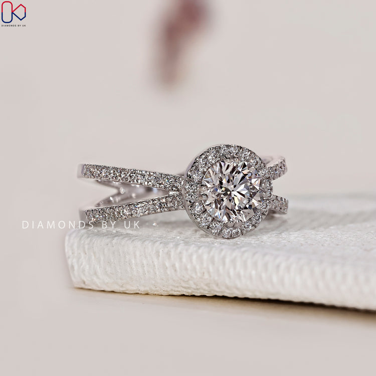 White gold ring with a double prong ring setting and a stunning halo diamond engagement ring.