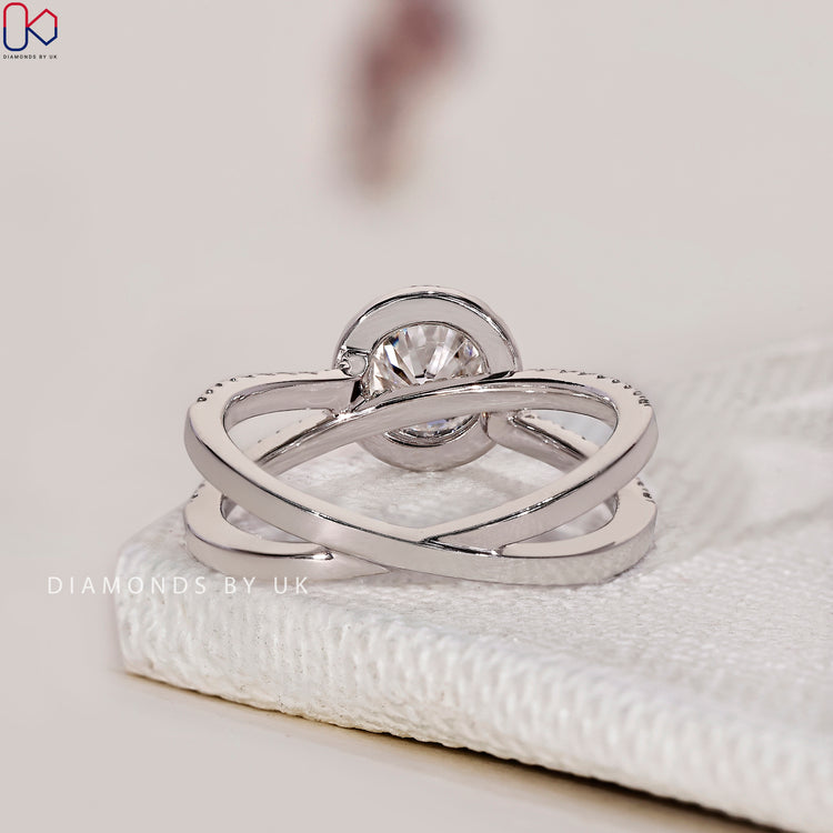 Shop to buy engagement ring featuring a beautiful pave setting ring and round diamonds.
