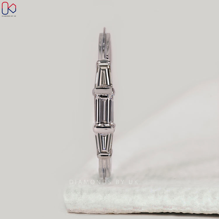 Buy wedding band in white gold.
