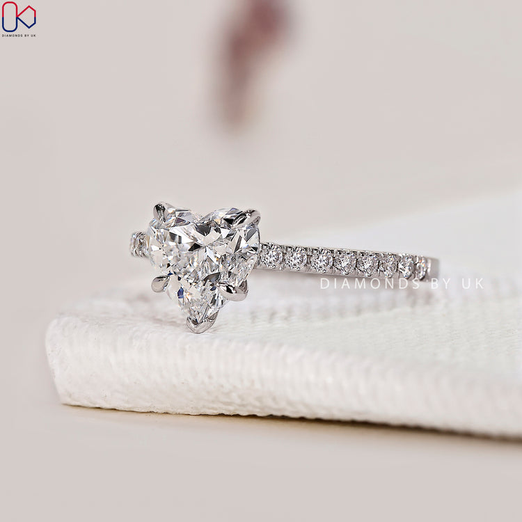 Pave Setting Ring with Lab Grown Diamond centrepiece.
