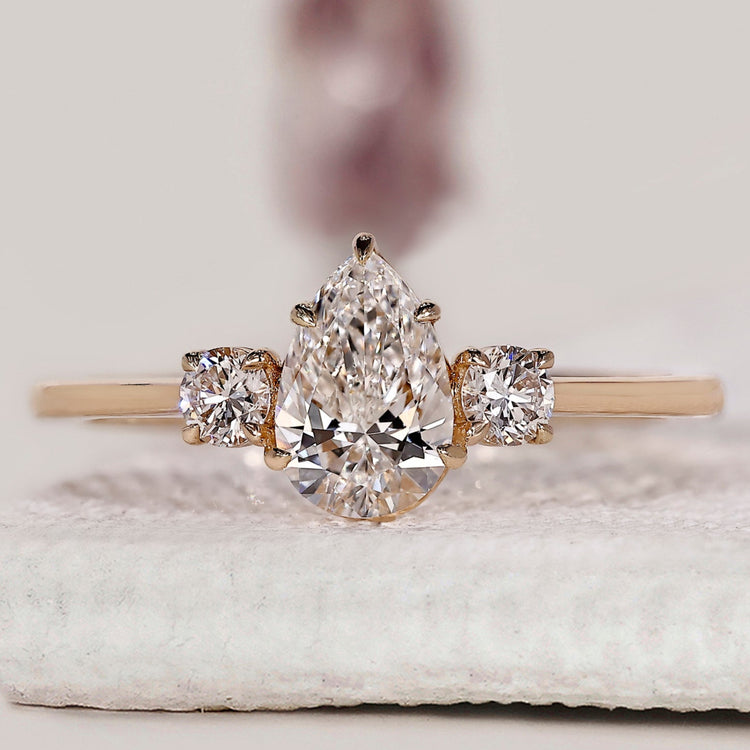 Pear Diamond Engagement Ring With Round Side Stone