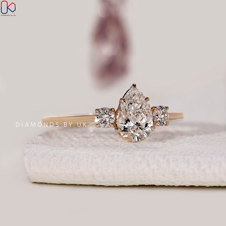 Yellow gold engagement ring with a polished band and secure fit.
