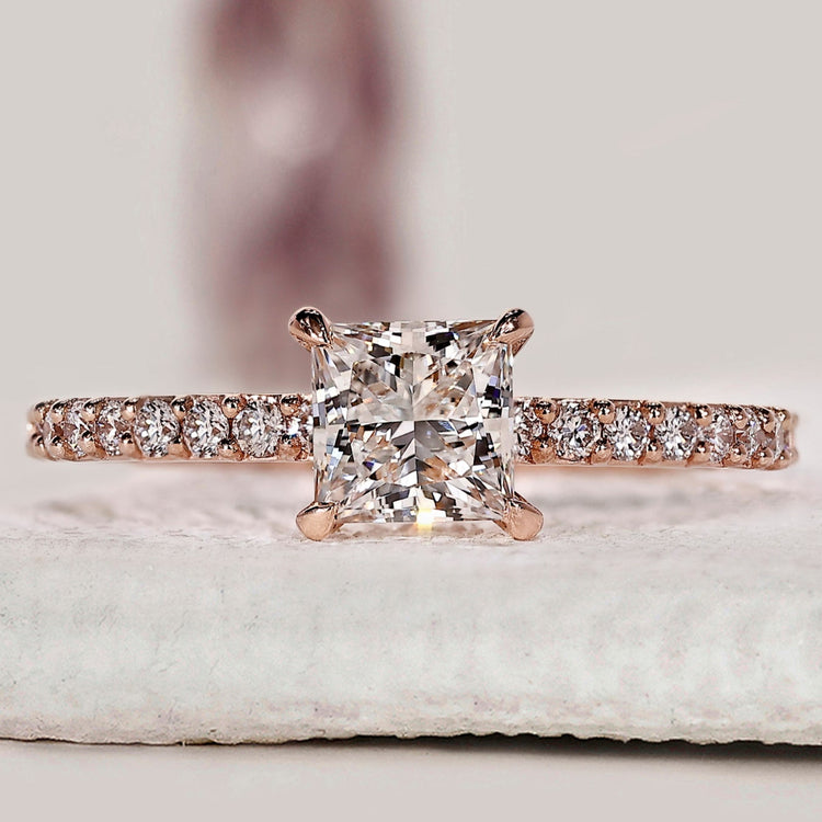 Princess cut engagement ring in rose gold.
