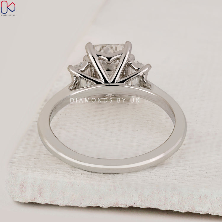 Handmade jewellery with 3 stone white gold setting.
