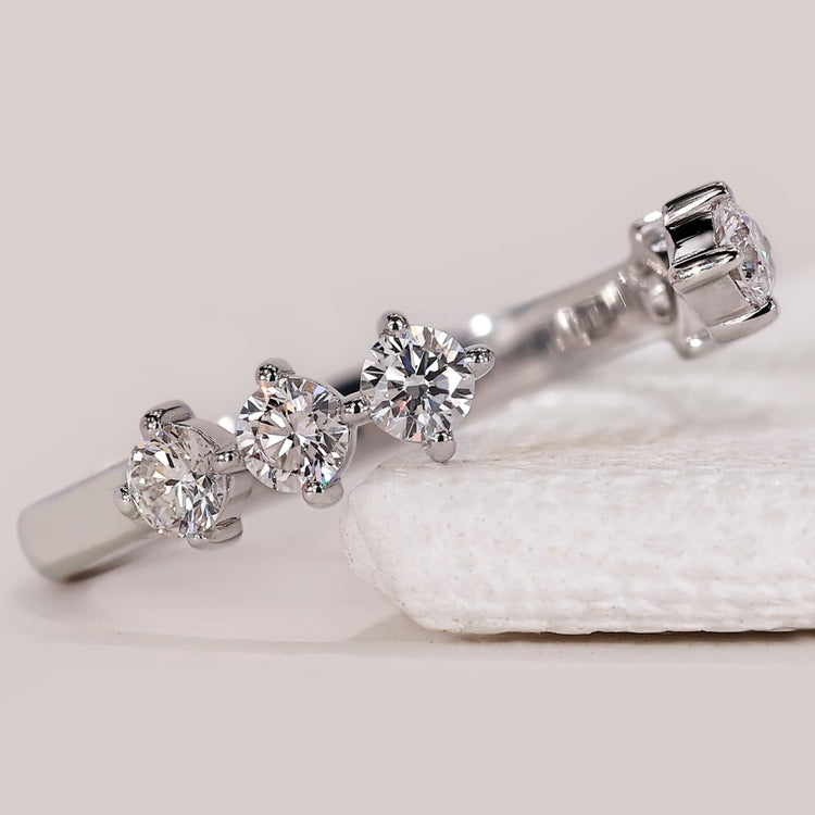 Round diamond wedding band with open gap wedding band.
