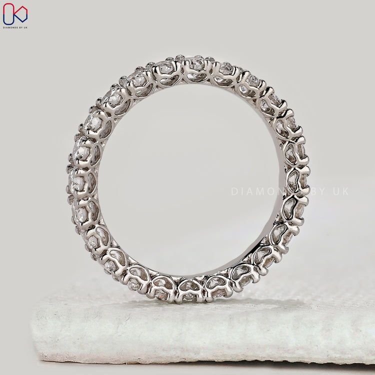 White gold diamond band with round diamond wedding band.
