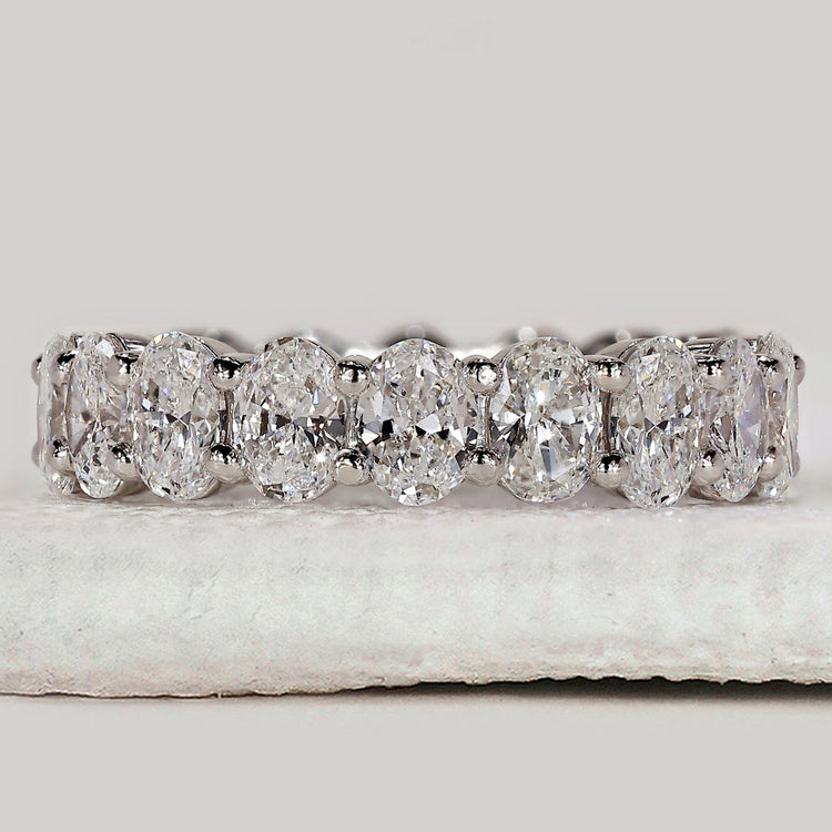 Oval diamond eternity band in white gold.

