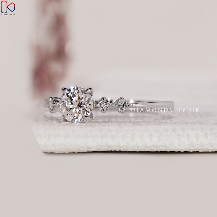 Round engagement ring set with stunning lab-grown diamonds.
