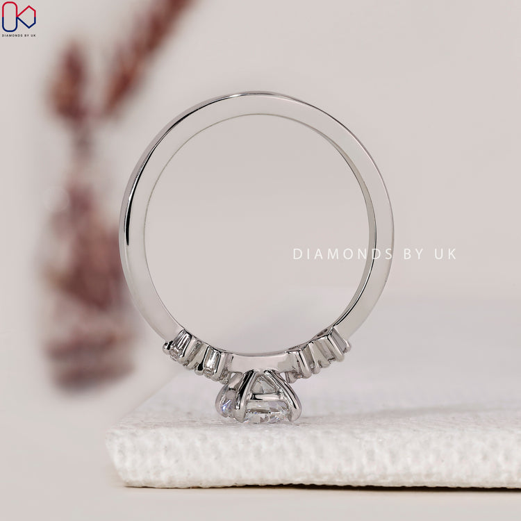Handmade jewellery featuring a round diamond set in a 4-claw prong setting.
