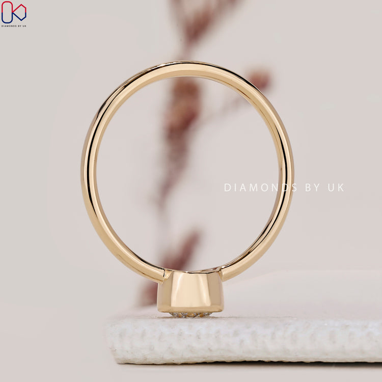 Handmade jewellery with solitaire diamond engagement ring.
