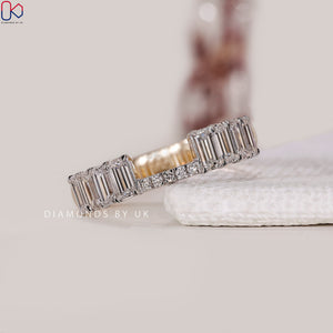 Emerald Cut Yellow And White Gold Wedding Band