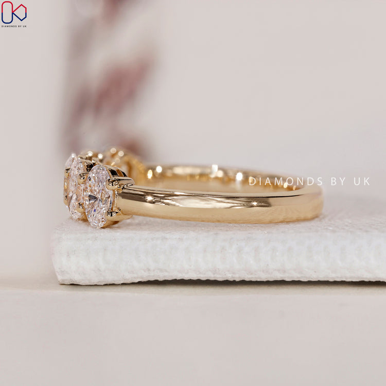 Lab Grown Diamond oval wedding band offering sustainable and eco-friendly beauty.
