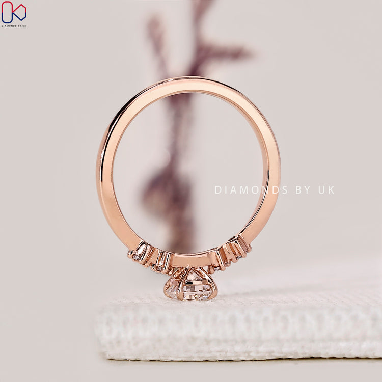 Custom prong setting ring with 4 claw design.
